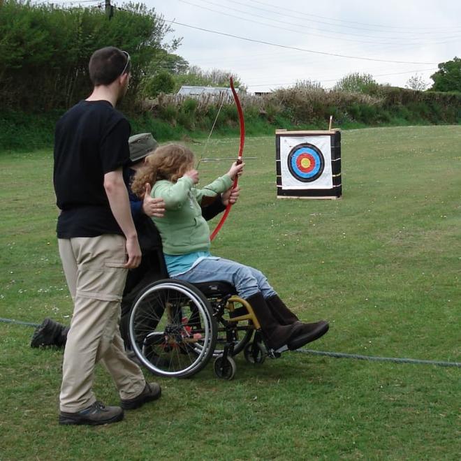 Heather taking part in archery. 