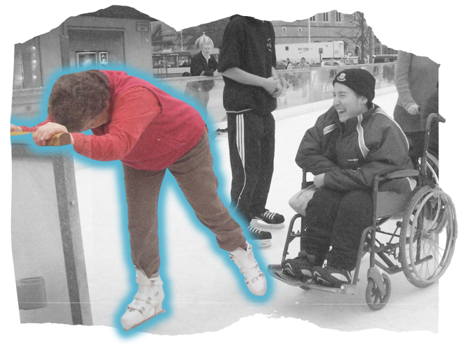 liz holding onto the side of an ice skating rink